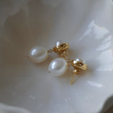 A pair of By Glaze recycled 18k gold hoop earrings with white double pearl drops perfect for bridal jewellery, bridesmaids or a chic statement pair 